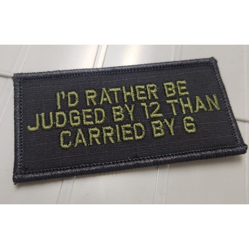 As Seen on Socials - I'd Rather Be Judged By 12 Than Carried By 6 - 2x4 Patch - Black w/OD