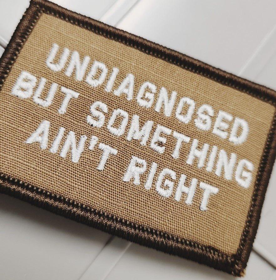Tactical Gear Junkie Patches As Seen on Socials - Undiagnosed But Something Ain't Right - 2x3 Patch - Coyote w/Silver